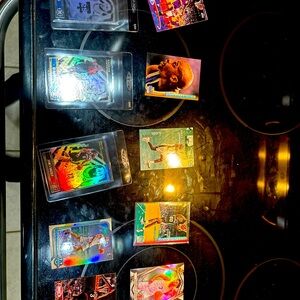 Baseball basketball and football trading cards mixture of all